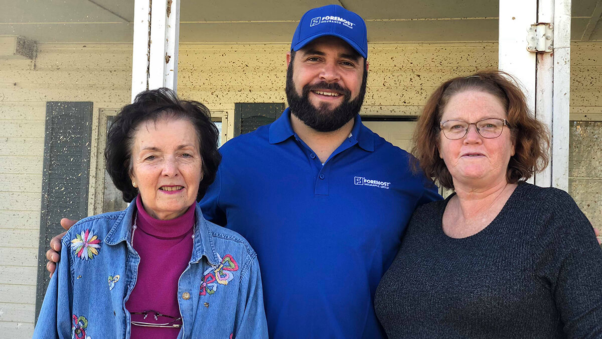 A Foremost claims adjuster smiling with Linda