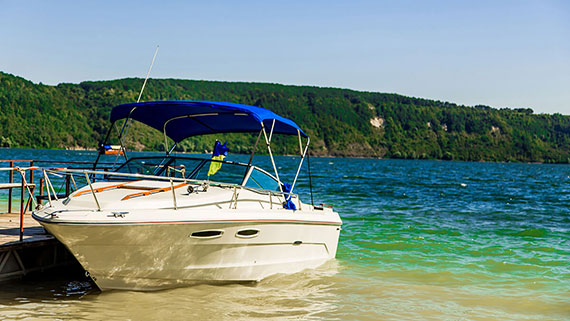 A boat speeding along making waves