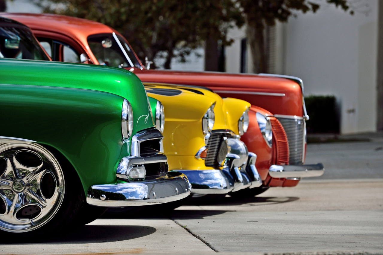 Nose shot of three classic cars