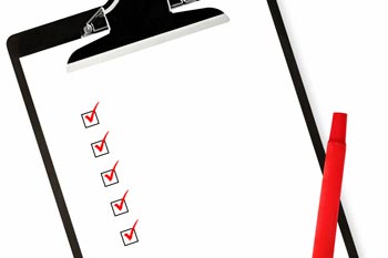 A checklist with red checks