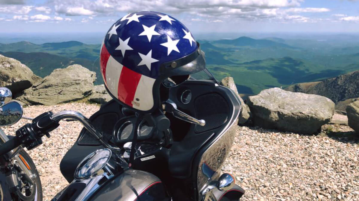 Motorcyclists riding up a mountain highway 